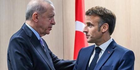 أردوغان يشيد بقرار ماكرون ويؤكد ضرورة «حل الدوليتن»