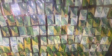 تموين قنا يضبط 141 بطاقة و30 جوال دقيق مدعم قبل بيعها بالسوق السوداء (صور)