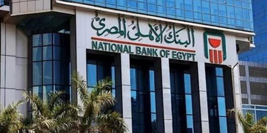 لعملاء البنك الأهلي، كيف تحول عبر بطاقة ميزة؟